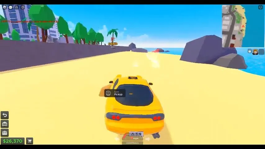 Taxi Boss sand pile on the beach with the R Pickup prompt beside a yellow taxi